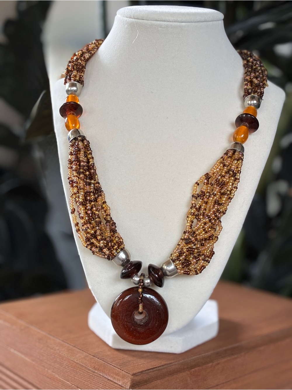 Amber-Tone With Brown And Gold Multi-Strand Beaded Necklace with Round Pendant